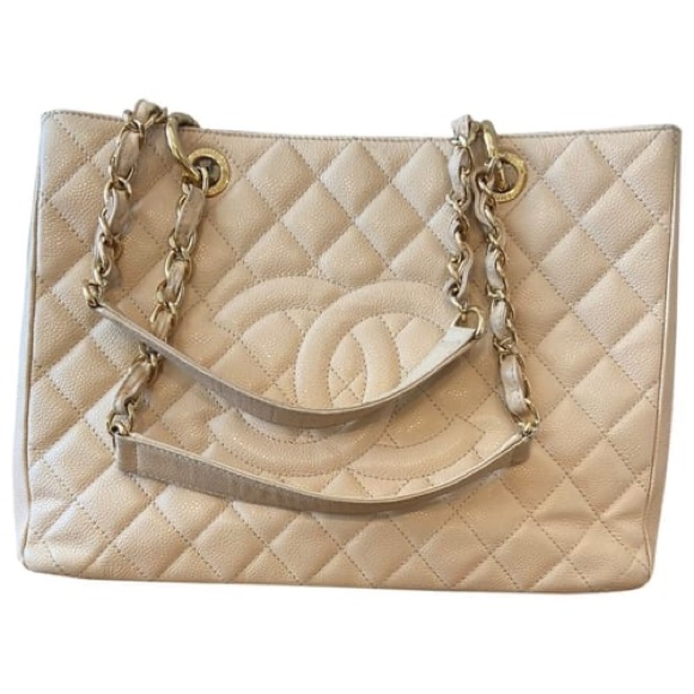 Chanel “Grand Shopping Tote” quilted beige tan caviar leather w/ silver hardware